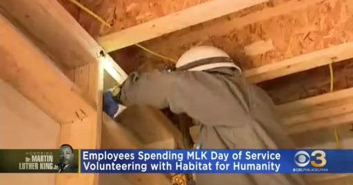 Volunteers help Habitat for Humanity to build homes in North