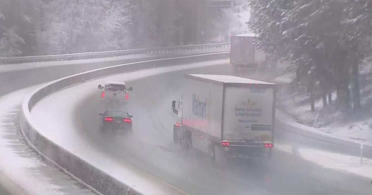 Skiers and snowboarders brave bad road conditions for fresh snow