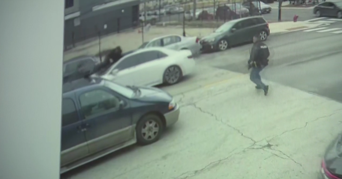 Car speeds off with man on roof during chase - CBS Chicago