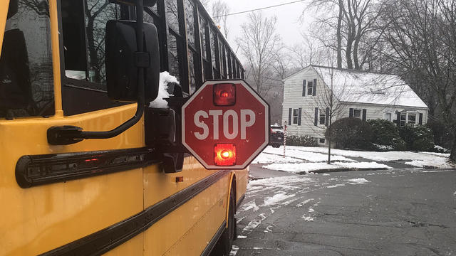 A J.R. Transportation school bus at a lot in Jersey City. 