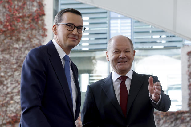 German Chancellor Olaf Scholz, right, welcomes Poland's Prime Minister Mateusz Morawiecki for the 'Western Balkans' conference at the Chancellery in Berlin, Germany, in a November 3, 2022 file photo