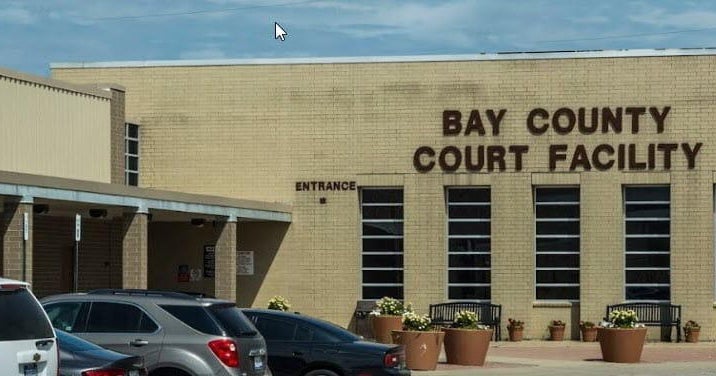 Former Michigan public service director charged for hitting teen with