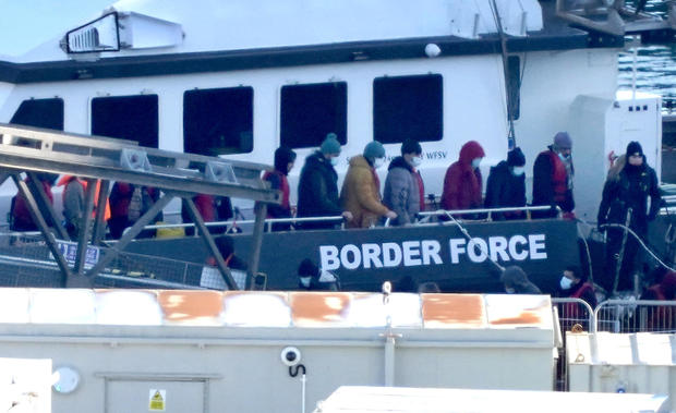 A group of people thought to be migrants are brought in to Dover, England, onboard a Border Force vessel following a small boat incident in the English Channel on January 2, 2023. 