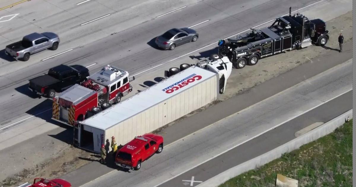 Strong winds whip through Southland, wreaking havoc on freeways - CBS ...