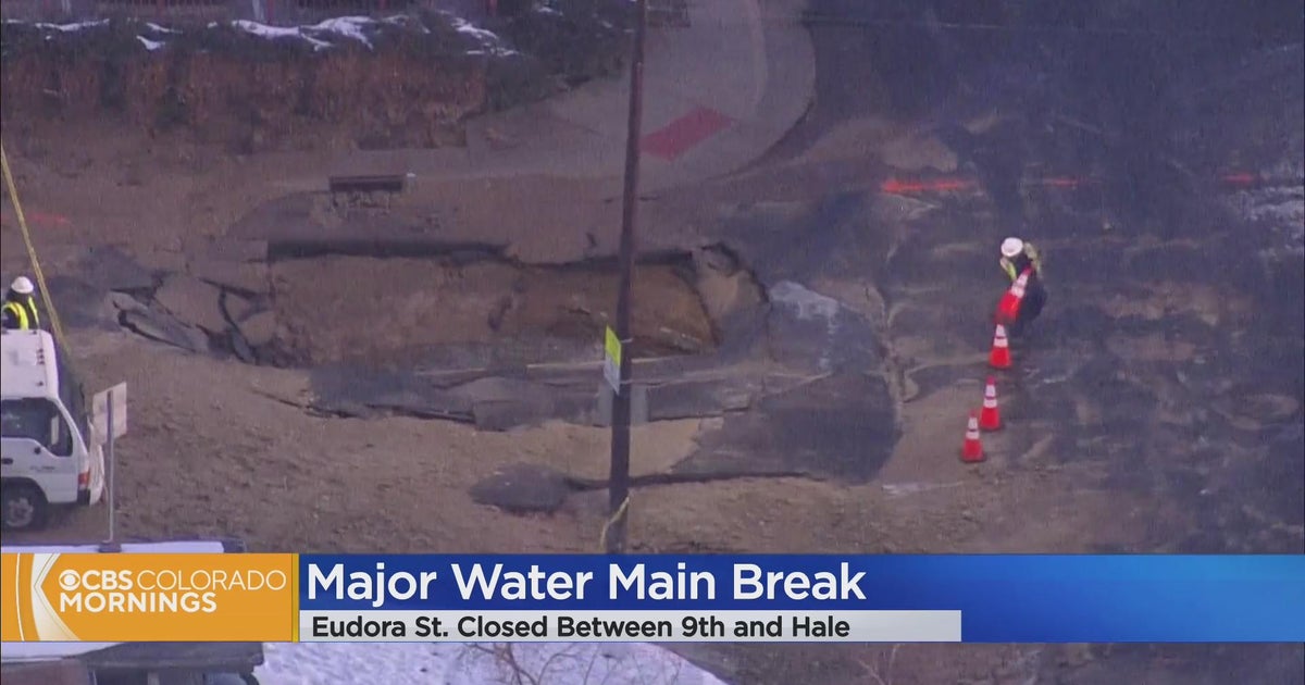 Denver water main break opens big hole in the street near Rose Medical ...