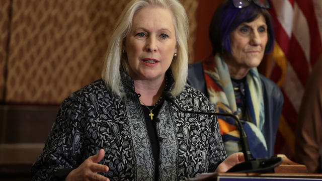 Sen. Kirsten Gillibrand (D-NY) speaks as Rep. Rosa DeLauro (D-CT) listens during a news conference on the Family and Medical Leave Act at the U.S. Capitol on February 1, 2023 in Washington, DC. 