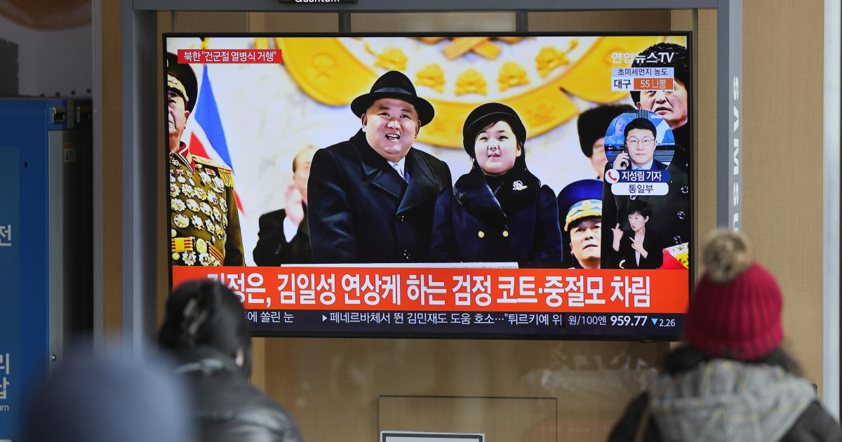Kim Jong Un shows off his weapons, and his daughter and possible heir, at a military parade