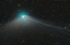 A green comet named Comet C/2022 E3 (ZTF), is seen journeying tens of millions of miles (km) away from Earth in this telescope image 