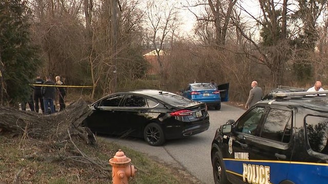 Generic police lights and yellow police tape at crime scene 