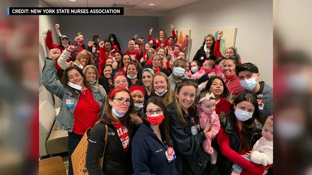 Dozens of nurses at South Shore University Hospital pose for a photo. 