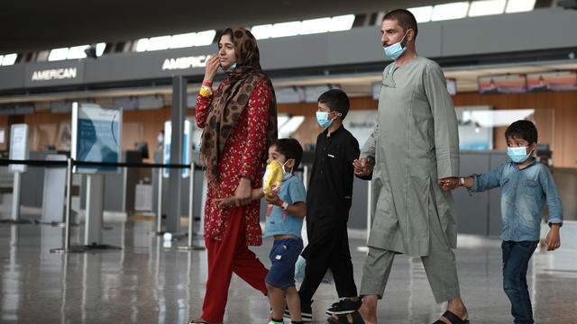 Afghan Refugees Arrive At Dulles Airport After US Pulls Out Final Troops 