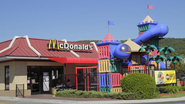 A playground outside McDonald's. 
