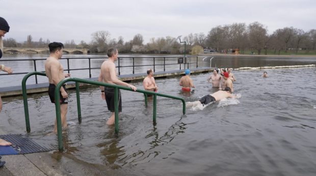 Swimmers dip in London's chilly Serpentine Lake 