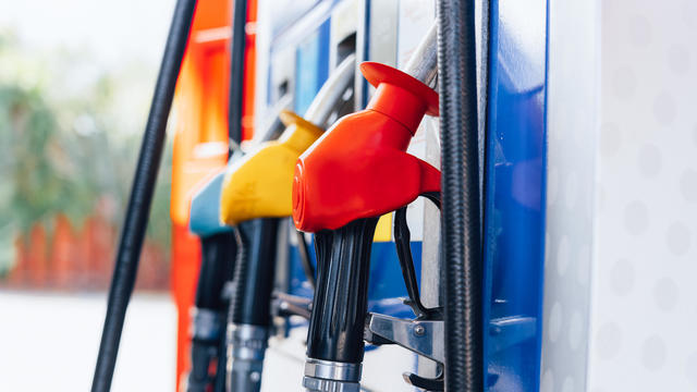 Fuel nozzles, Close-up of fuel pumps at gas station 