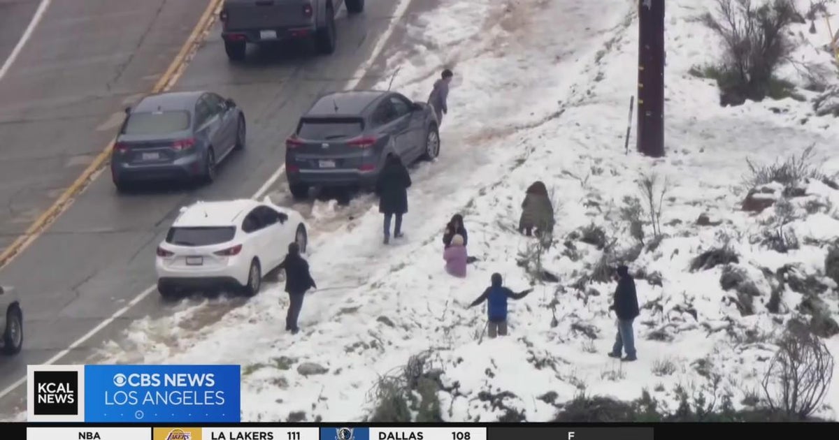 Residents flock to snow covered SoCal mountains - CBS Los Angeles