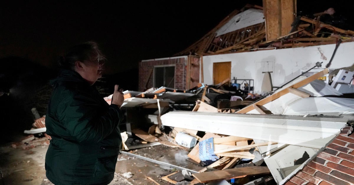 Tornado races through Norman, Oklahoma, injures at least a dozen, tosses vehicles around