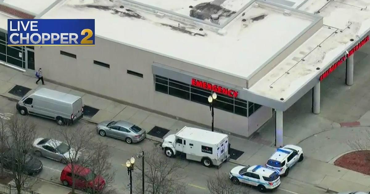 Chicago Shooting Armored Car Guard Shot Outside Chatham Business Cbs Chicago 8762