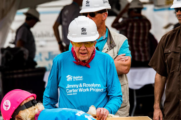 Former US President Jimmy Carter Jimmy Carter works on one 