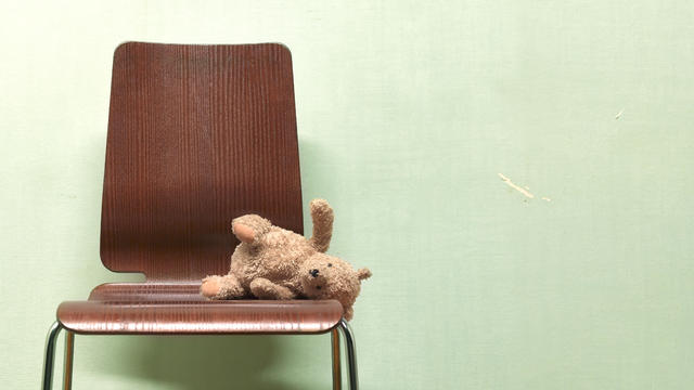 CHILDS FORGOTTEN, ABANDONED TEDDY ON CHAIR 