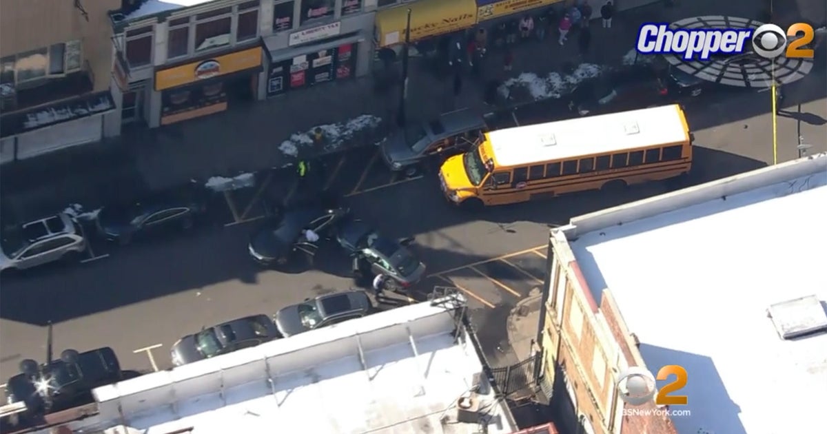 Newark school bus collides with stolen car