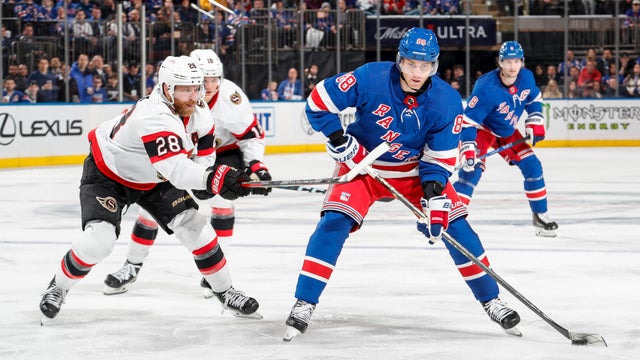 Patrick Kane #88 of the New York Rangers skates with the puck against Claude Giroux #28 of the Ottawa Senators during the third period at Madison Square Garden on March 2, 2023 in New York City. 
