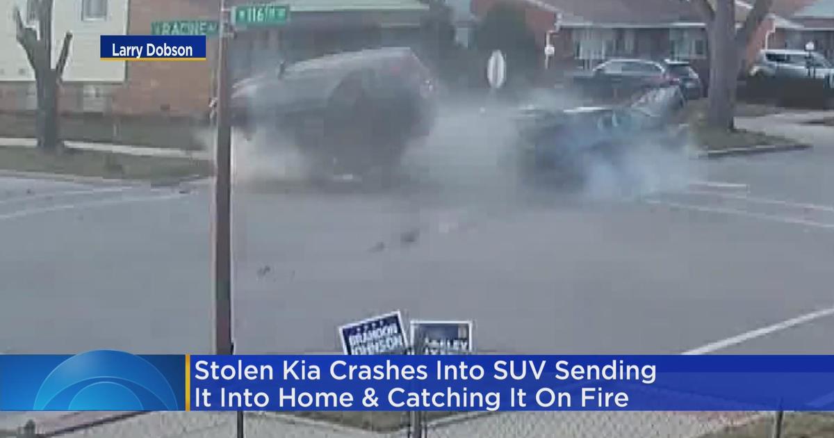 Stolen Kia hits SUV, sending it into home, where it caught fire - CBS ...