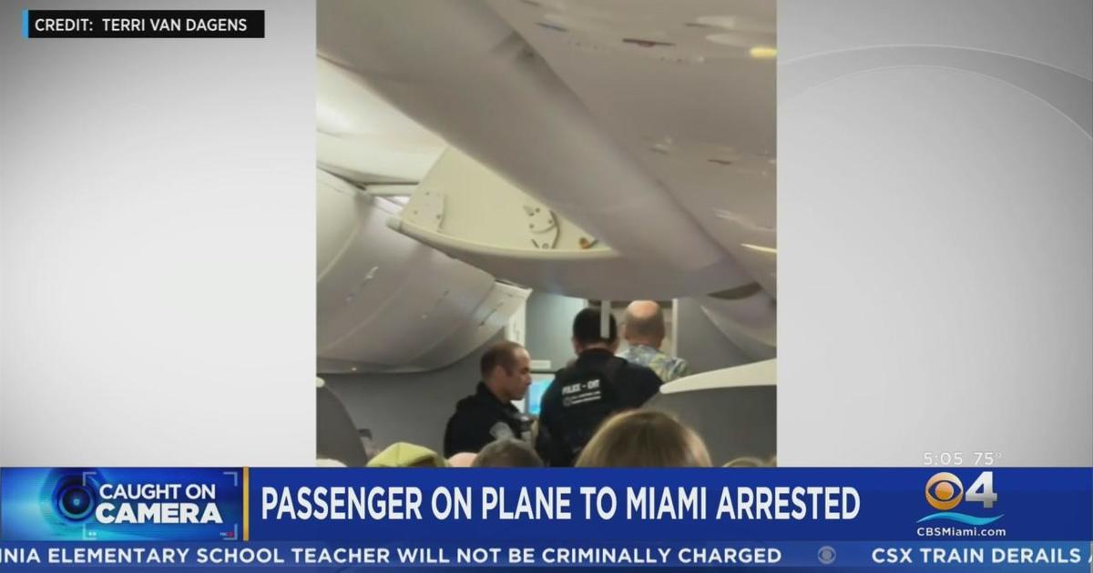 Male arrested on flight to Miami