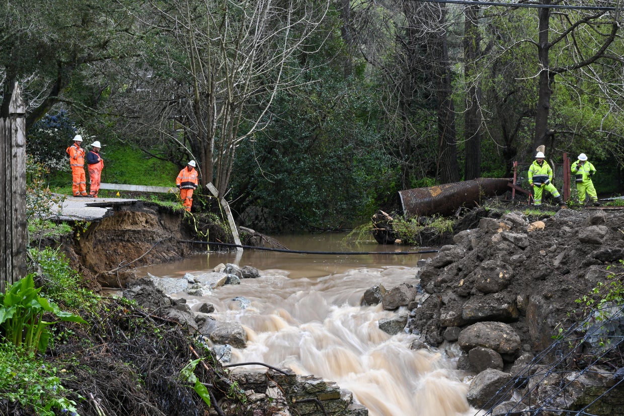 A road washed away in Santa Cruz as an atmospheric river hit California on March 10, 2023. 