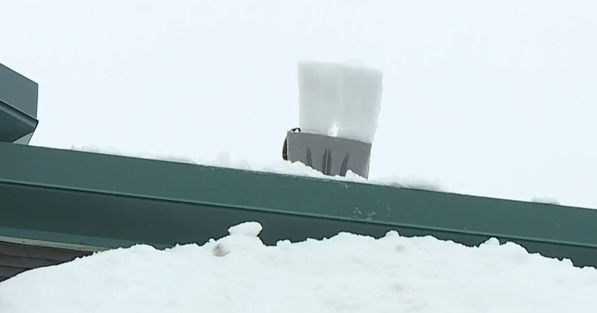 Roof at Grass Valley strip mall being cleared of snow after partial collapse