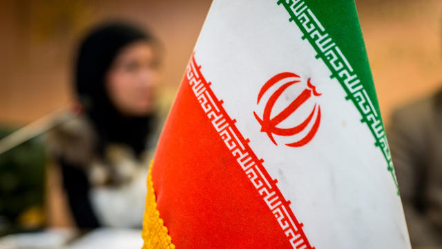 Iranian flag on conference table 