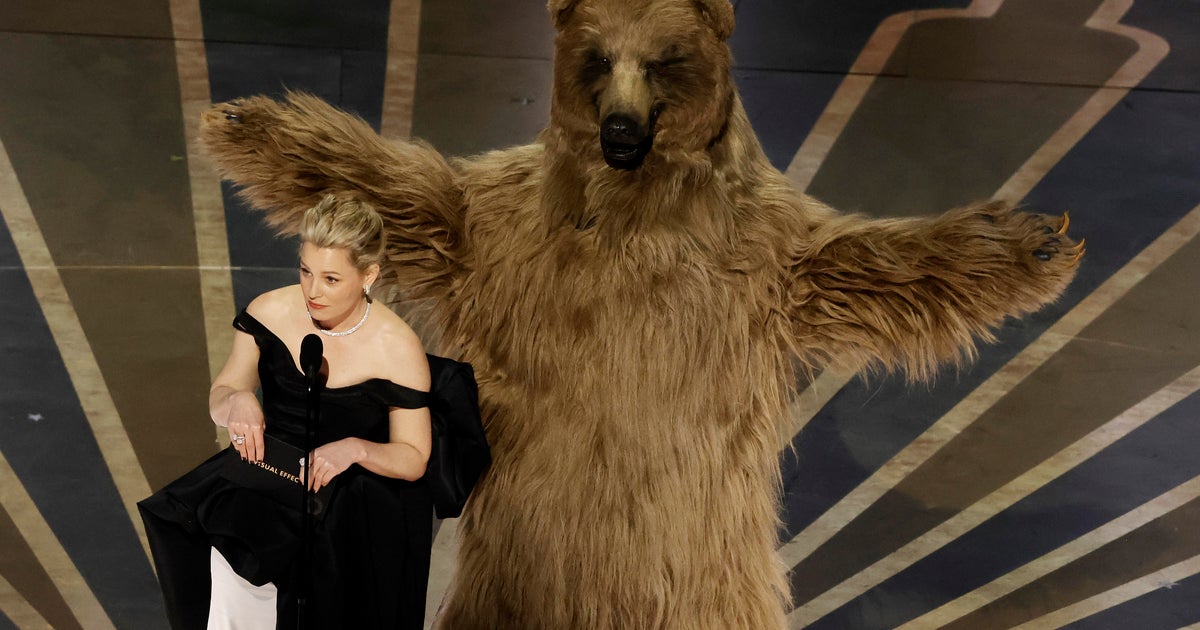 Cocaine Bear joins Elizabeth Banks on stage at the Oscars