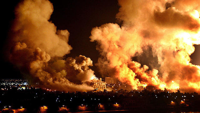 Fires rage on the west bank of the Tigris river on March 21, 2003, in Baghdad, Iraq. 