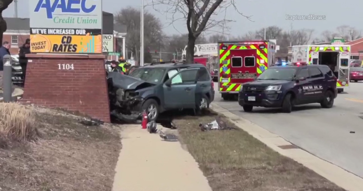 SUV hits sign in Arlington Heights
