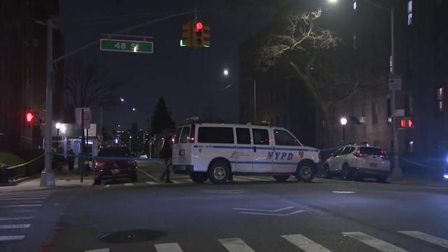 An NYPD vehicle blocks off an intersection. 