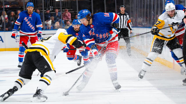 Artemi Panarin #10 of the New York Rangers skates with the puck against the Pittsburgh Penguins at Madison Square Garden on March 18, 2023 in New York City. 