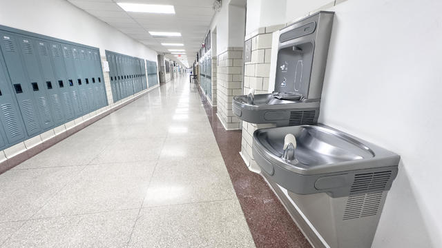 Drinking fountain in school corridor 
