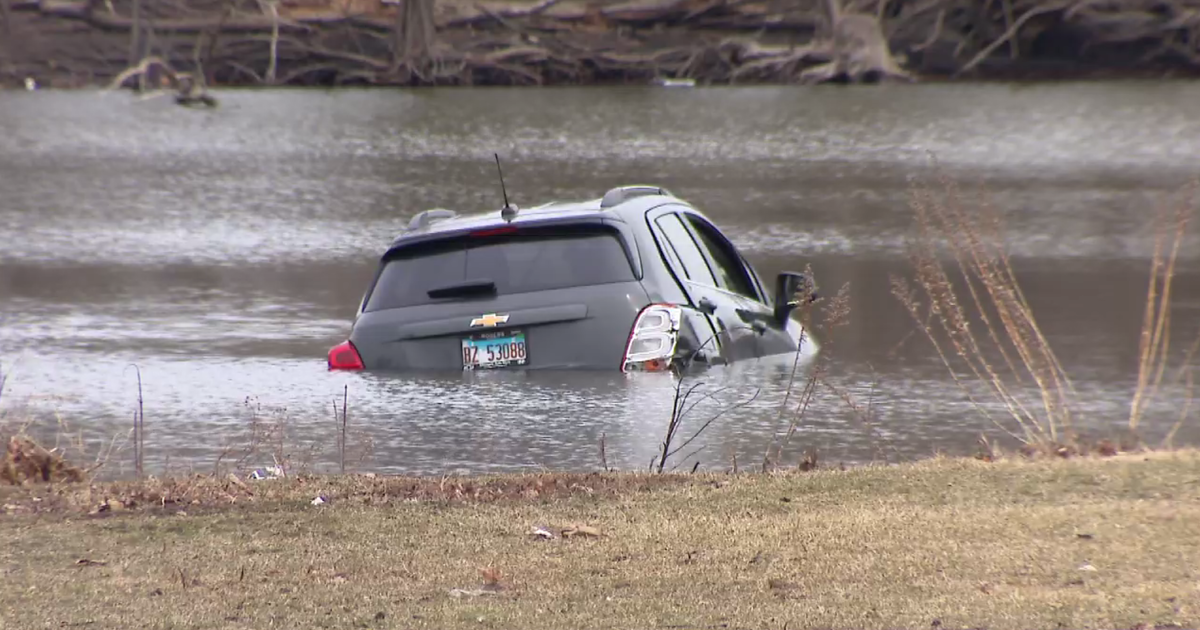 Woman rescued after car crashes into Garfield Park lagoon