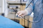 Manipulator digital endoscope for diagnostics of hollow organs, colonoscopy, gastroscopy. Selective focus on doctor`s hands 