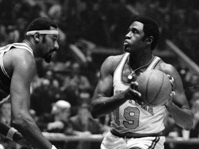 Center of Attention. New York Knicks Willis Reed (19) moves 