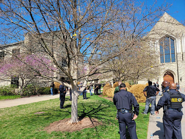 Police officers arrive at the Covenant School and Covenant Presbyterian Church after reports of a shooting in Nashville, Tennessee, March 27, 2023. 