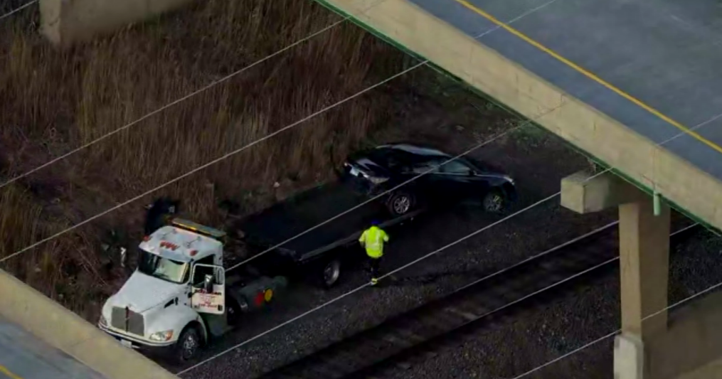 Person hospitalized after car drives off I-57 onto tracks - Vimarsana News