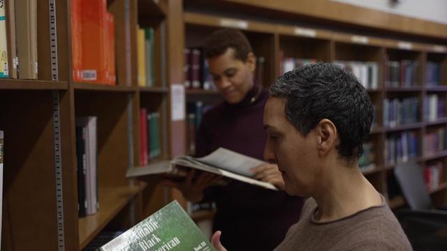 Rhonda Evans, the assistant chief librarian of the Jean Blackwell Hutson Research and Reference Division, and Maira Liriano, the associate chief librarian 