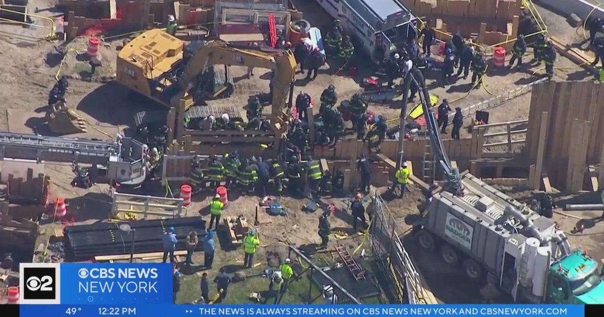 Construction worker trapped in trench at JFK Airport - CBS New York