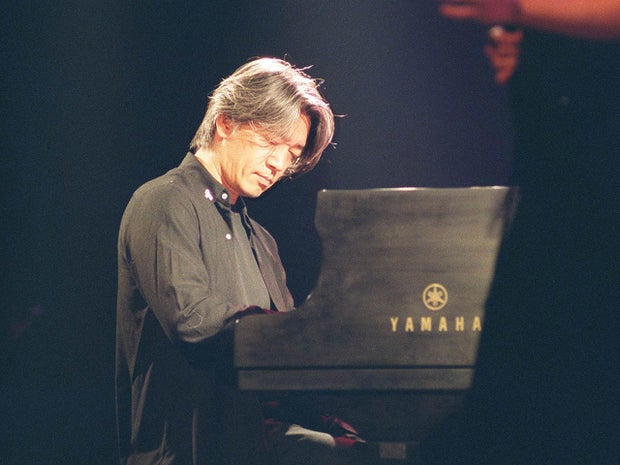 Ryuichi Sakamoto in concert in Madrid in 2002. | Carlos Muina/Cover/Getty Images