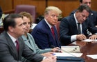 Former President Donald Trump sits at the defense table with his defense team in a Manhattan courtroom on Tuesday, April 4, 2023, in New York. 