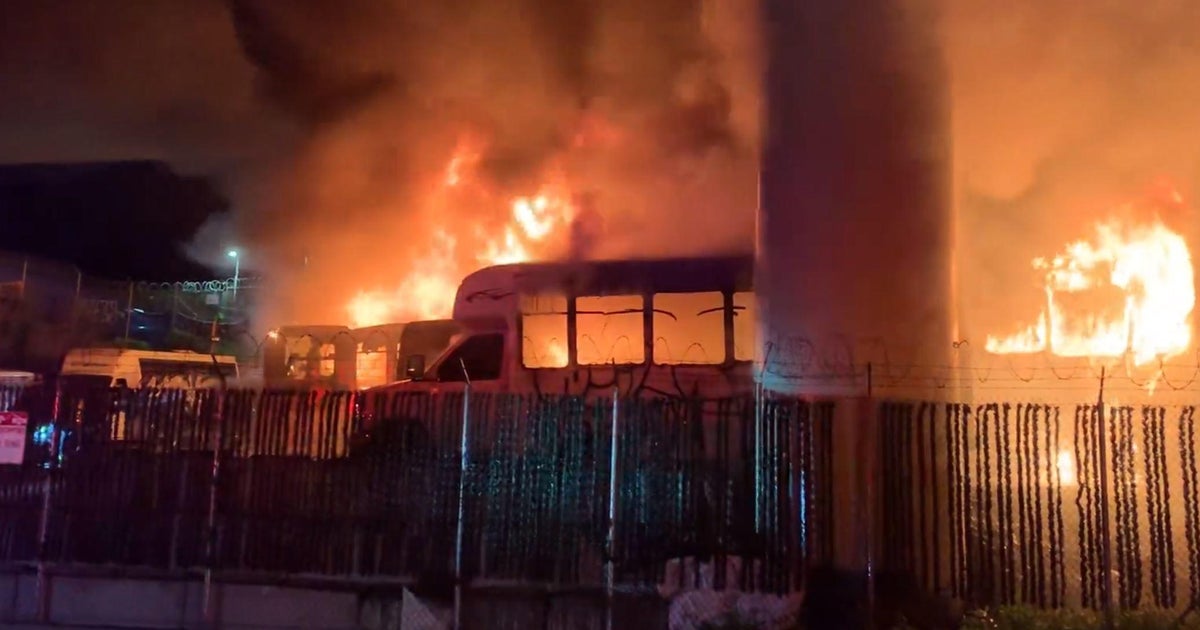 Late night fire engulfs 12 minibuses in flames under San Francisco ...