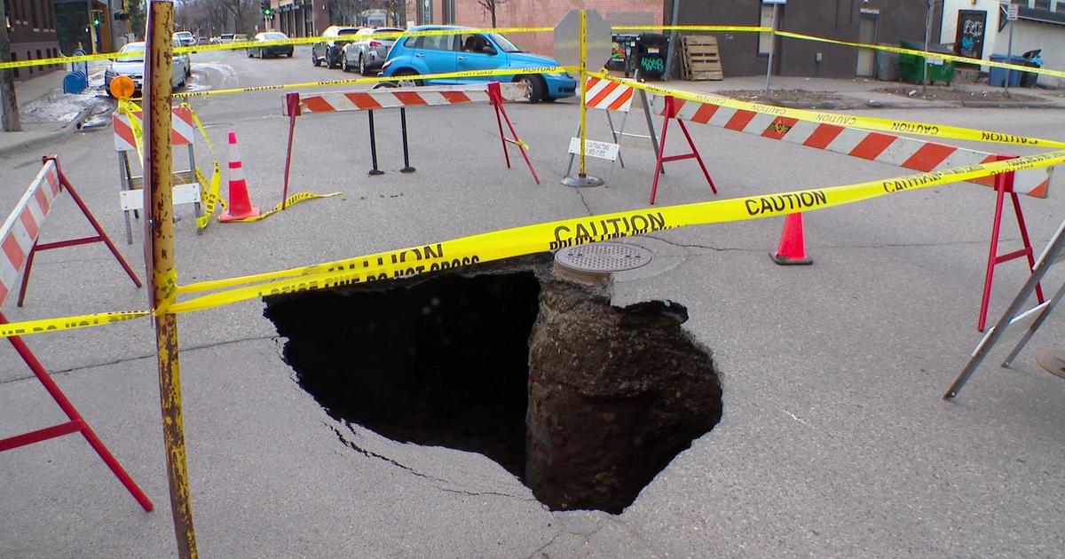 Large sinkhole appears on Minneapolis street, not far from infamous