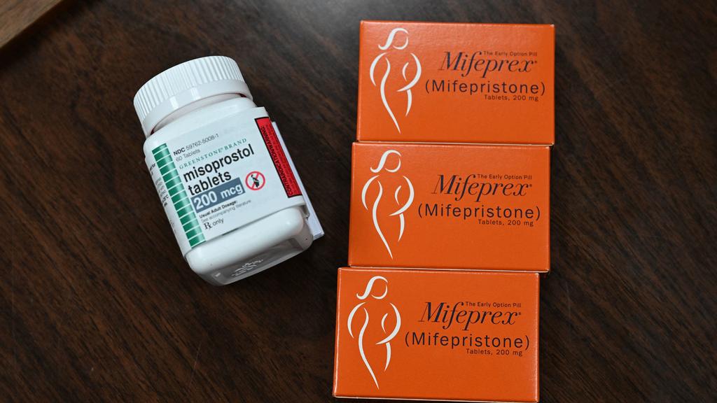Federal appeals court preserves access to abortion pill for now but tightens rules
