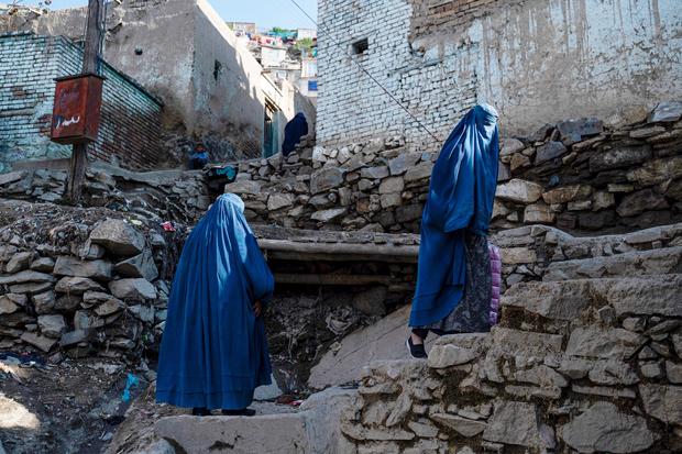 Afghan women wearing blue burqas in Kabul 