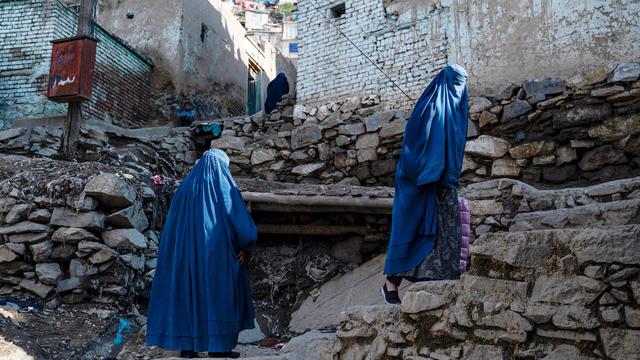 Afghan women wearing blue burqas in Kabul 
